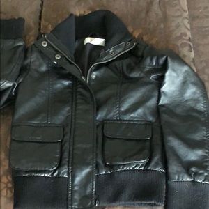 Sweater accents faux-leather bomber jacket